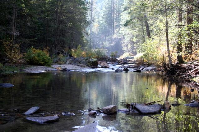 River pool and exposed rock on the claim